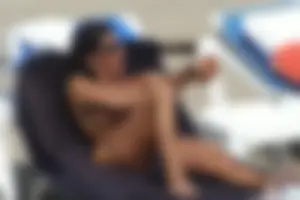 Girls on a nude beach in Sitges, Spain