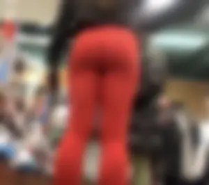Adorable college babe shopping in tight red leggings