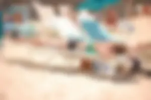 Assortment of sexy babes at the beach in bikinis