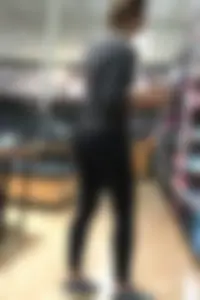 Shoe store employee with a sexy bubble butt in leggings