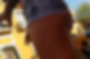 Nice legs and a little peach showing, shorts