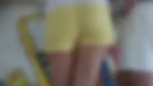 Milf in yellow shorts with vpl and a wedgie