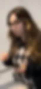 Cute College Girl With Flared Leggings And Glasses