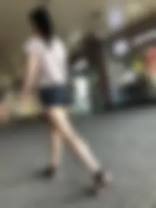 Awesome candid chick wearing mini shorts, perfect long pale legs