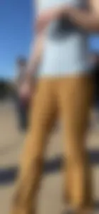 Cute brunette in mustard flares cameltoe!!!