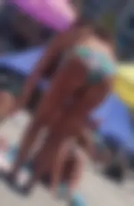 Thick and skinny sexy friends on the beach in bikinis