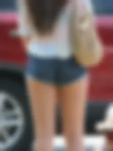 Denim short babe with a wedgie showing some cheeks