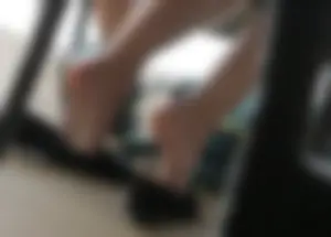 Female Feet With Flats Taken Off Under Table - Photos From College Classroom