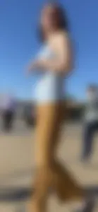 Cute brunette in mustard flares cameltoe!!!