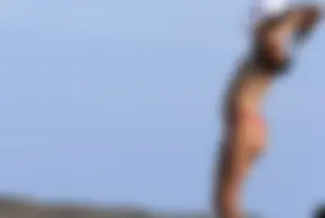 Sexy girls topless on a nude beach showing their nice tits