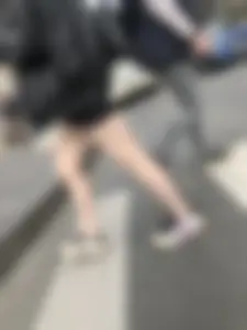 Very hot legs of a candid girl wearing a leather jacket