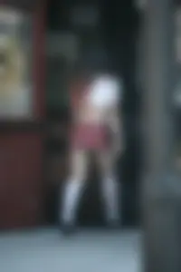 Two sexy Tilted Kilt employees showing cleavage and cheeks