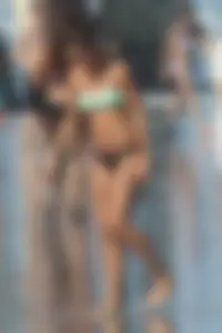 Beach girl out in a bikini with a nice round big booty