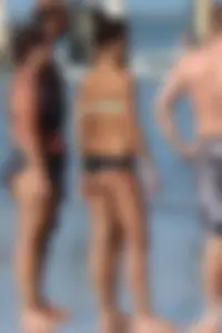Beach girl out in a bikini with a nice round big booty