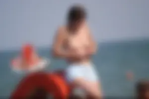 Girls on a nude beach in Bibione, Italy