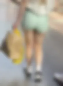 Sexy blonde in green shorts