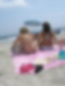 Stalking the busty girl on the beach