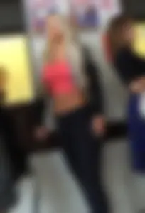 Gorgeous blonde in a top and tigths with a pierced navel creepshot