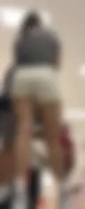 Amazing Asian in white yoga shorts upshot bends squat at Target