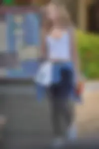 Beautiful babe out walking in leggings and showing some cleavage of her perfect tits