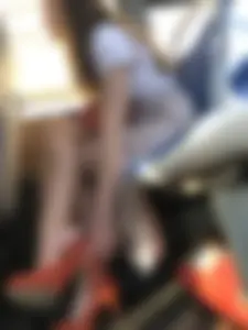 Girl Adjusting her Shoe with High Heel Bus Candid