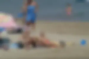 Girls on a nude beach in Sitges, Spain