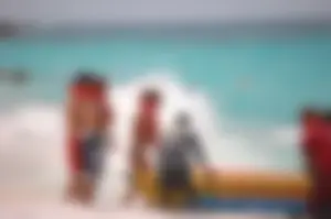 Assortment of sexy babes at the beach in bikinis