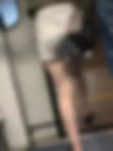 Subway train and subway station creepshots of a candid girl wearing shorts with pale skinny legs
