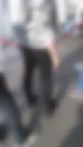 Girl wearing a black skirt over her leggings