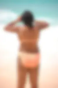 Assortment of sexy babes at the beach in bikinis