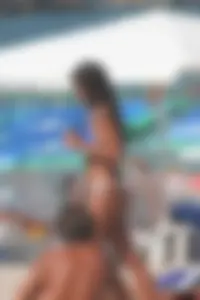 A bunch of sexy beach voyeur babes in bikinis, thongs and topless