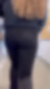 Cute College Girl With Flared Leggings And Glasses