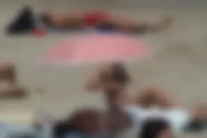 Girls on a nude beach in Sitges, Spain