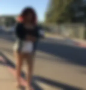 Big boobed redhead walking with no shoes and in shorts