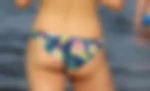 Blue floral bikini babe on the beach