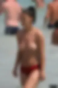 Sexy candid topless and nude beach girls