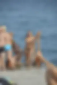 Sexy skinny babe in thong bikini on the beach