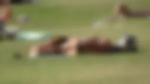 Park girl with a nice ass in black semi thong bikini