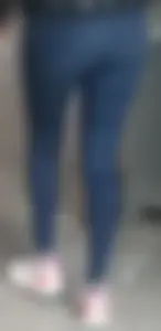 Girl in jeans walking with her boyfriend