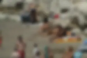 Girls on a nude beach in Sitges, Spain