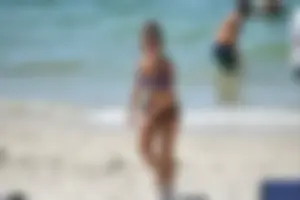 Sexy ass girl with a perfect body in her bikini on the beach