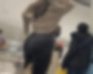Fat butt Latina in black leggings shopping at h&m