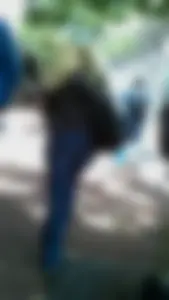Blonde in tight jeans with her red thong sticking out