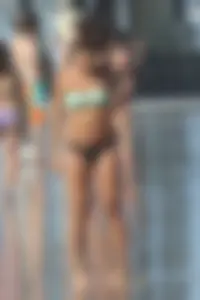 Beach girl out in a bikini with a nice round big booty
