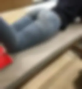 Hot Ass in Tight Jeans - Girl Lying on the Mattress on Her Stomach
