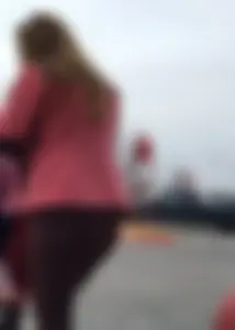 Target milf with a decent ass in maroon leggings