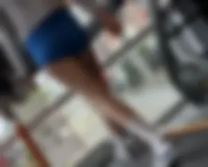 Gym girl in tight shorts with great ass. Also looking straight at the camera