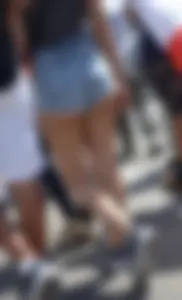Thick booty babe in denim shorts showing her cheeks