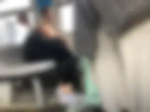 Hot Girlfriend in Pants And White, Slightly Dirty Socks, Her Sneakers Taken Off, Chilling on the Train Seat With Her Head on Her Boyfriend's Lap