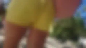 Milf in yellow shorts with vpl and a wedgie
